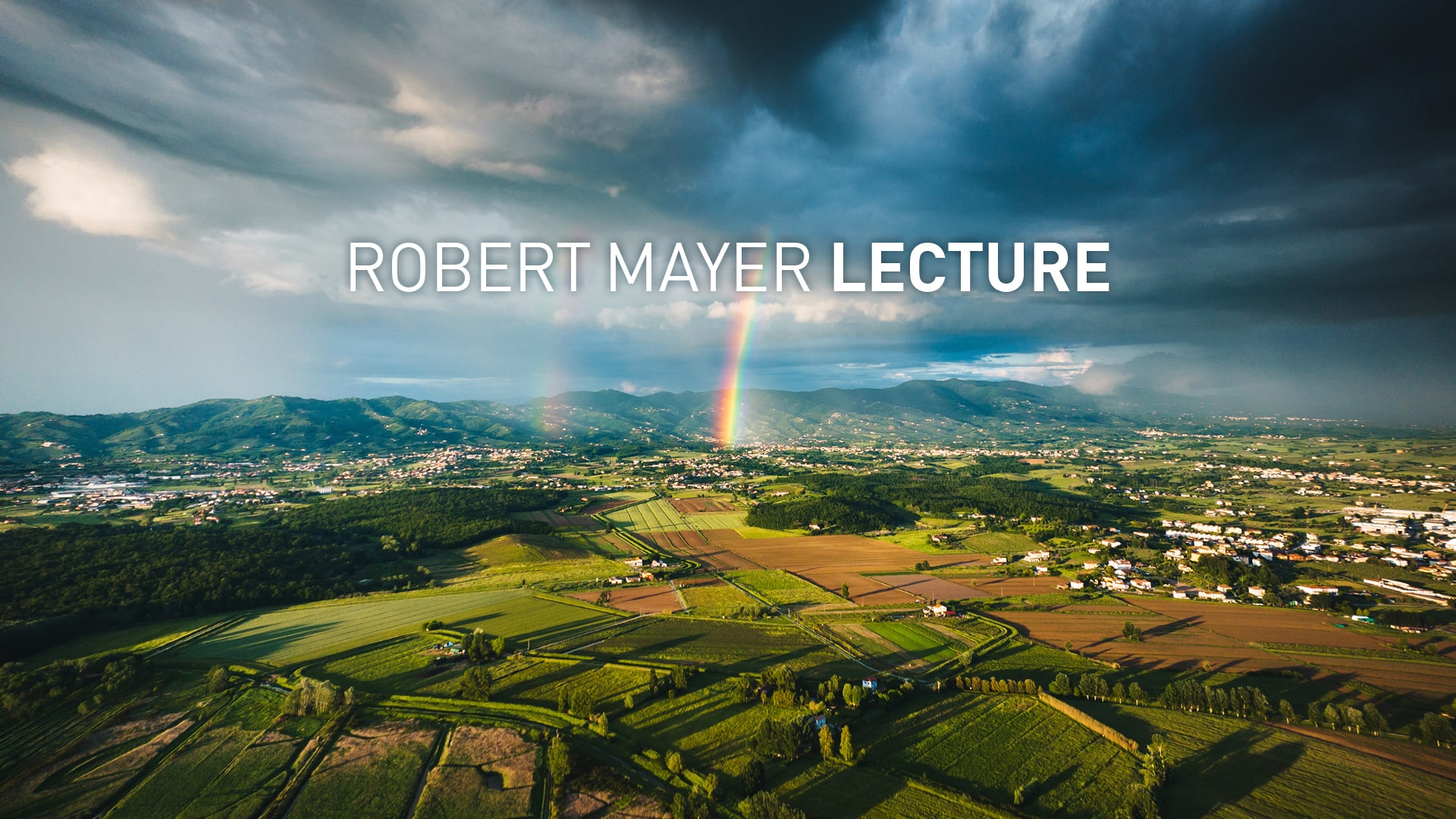 Landschaftsfoto mit Schriftzug Robert Mayer Lecture